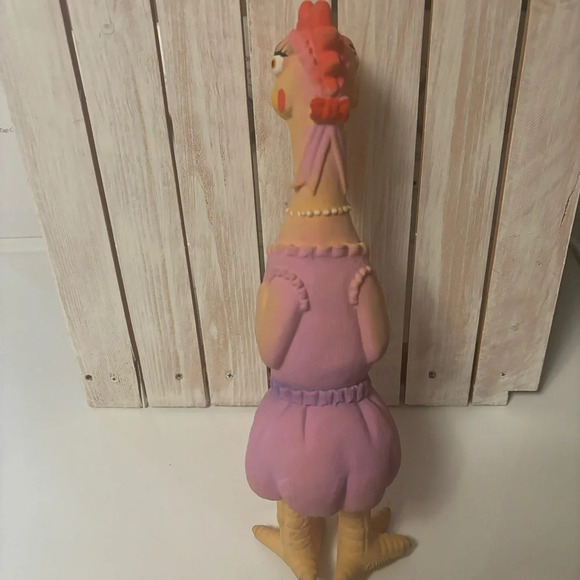 Lady squeaking chicken - Picture 2 of 6